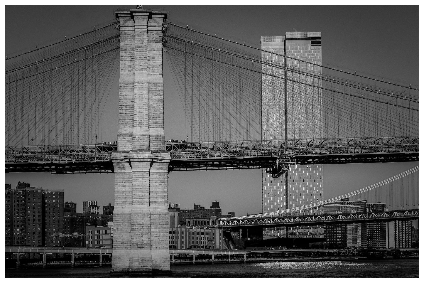 Brooklyn Bridge, with Manhattan Bridge in distance and NYC skyscrapers