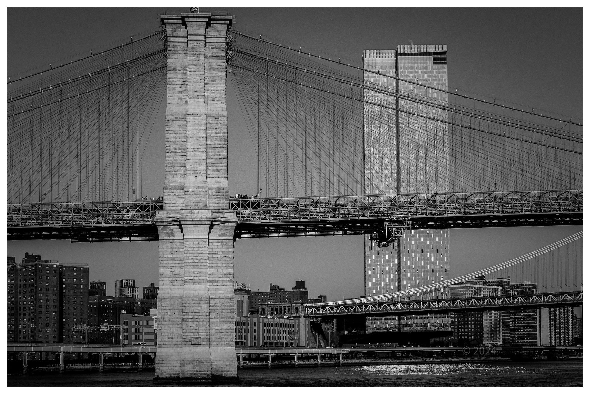 Brooklyn Bridge, with Manhattan Bridge in distance and NYC skyscrapers